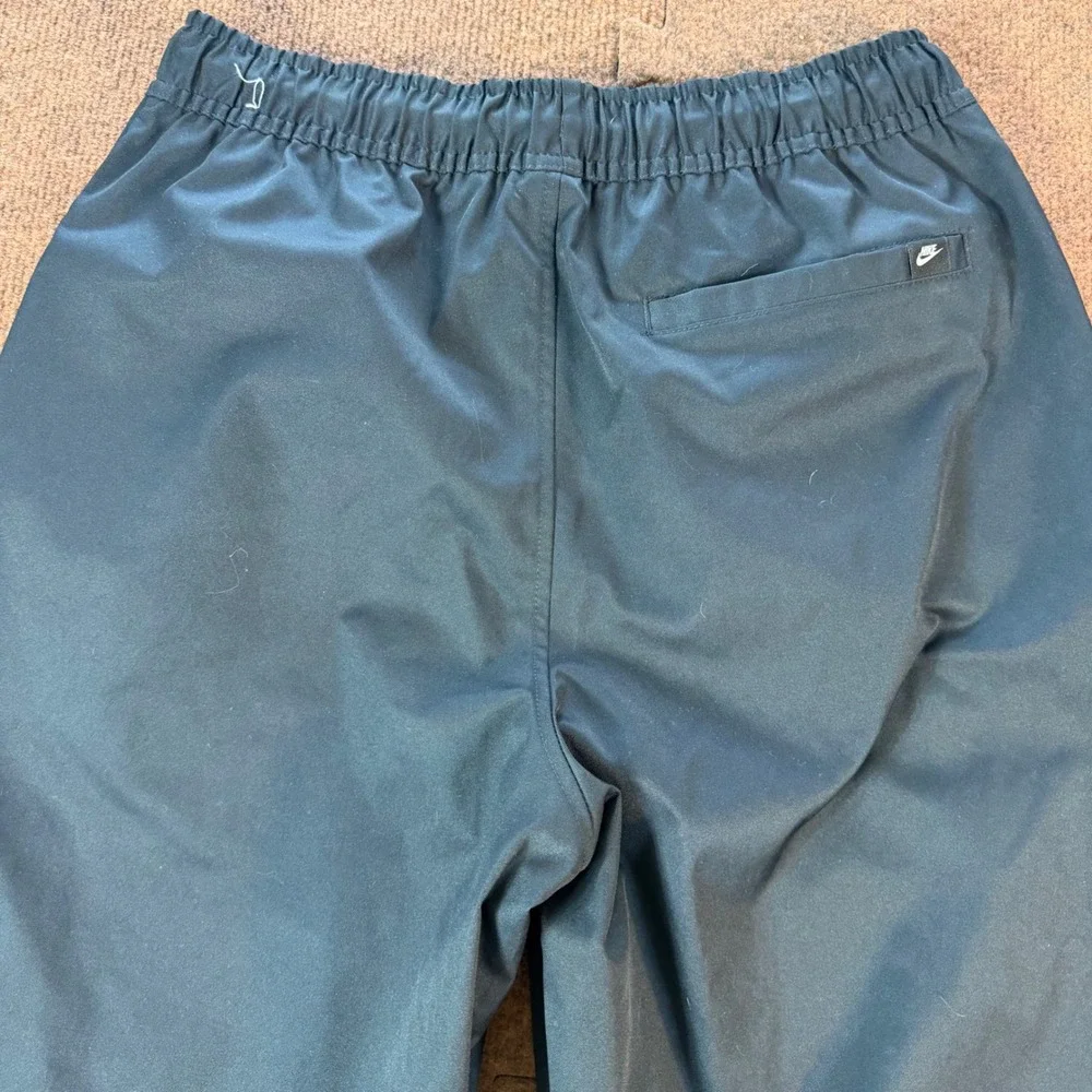New w/o tags A+ Nike Mens Woven Sportswear Pants Black Elastic Waist Size Small